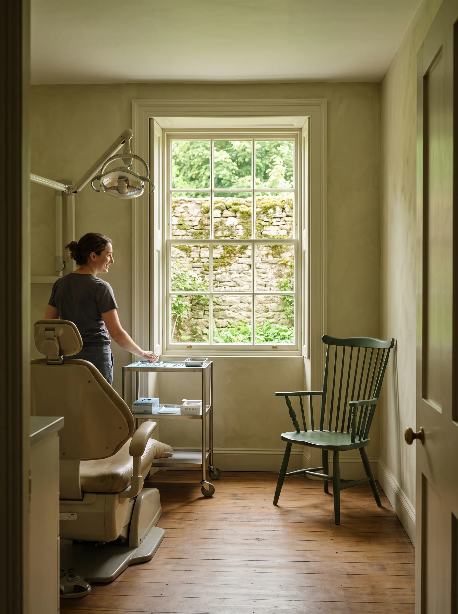 Sam's surgery at the back of the house, with the window onto the garden wall