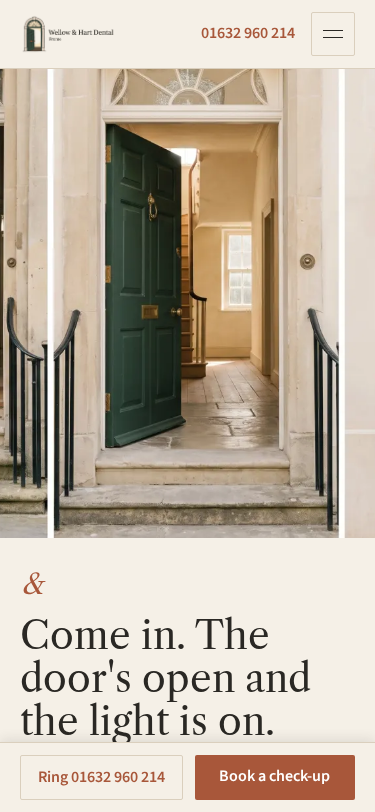 Wellow & Hart Dental home page on a phone